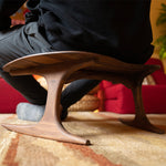 Bodhi meditation chair side profile showing curved legs
